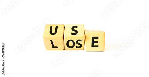 You use or lose it symbol. Concept word Use or lose on wooden cubes. Beautiful white table white background. Business and you use or lose it concept. Copy space.