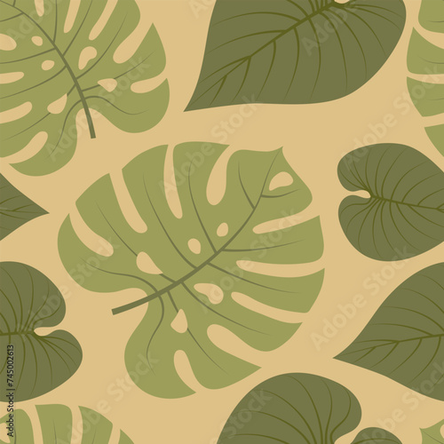 Seamless pattern with hand drawn tropical leaves on beige background.