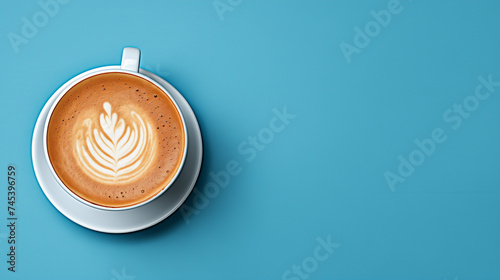 Cappuccino with Latte Art on Blue Background - Aromatic Coffee Presentation