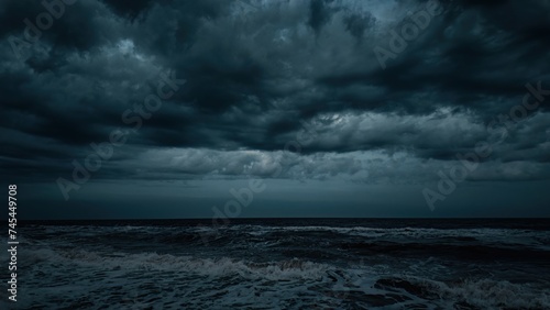 Evening dramatic sky with storm clouds, stormy ocean shore