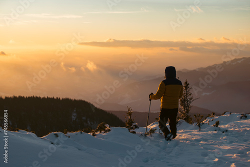 Hiker in a wintry mountain landscape