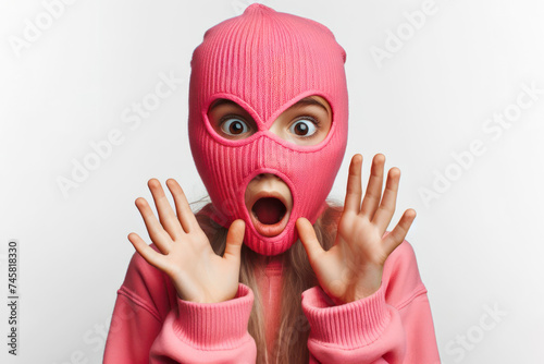 girl in a pink robber mask with a shocked expression isolated on solid white background. ai generative