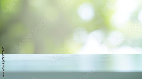 Soft focus on a tranquil green nature background with light bokeh effect.
