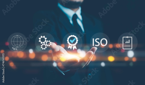 ISO standards quality control, assurance and warranty business technology concept. Touching on screen with ISO and globe icons on smart background. ISO Standard certification. Modern ISO banner.