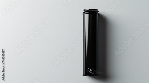 Black canon battery on white background