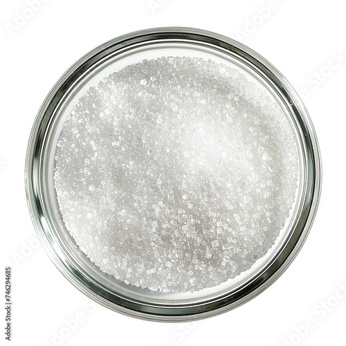 Granulated sweet sugar in a glass bowl isolated on white