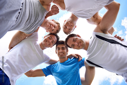 Men, circle and portrait with sports in low angle for hug, support or teamwork at training in nature. People, group and happy to embrace in huddle, scrum or together for exercise, workout or fitness