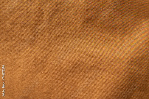Brown Knit polyester fabric or Polyethylene terephthalate cloth material texture background