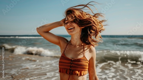 stylish young woman on the beach