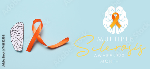 Awareness banner for Multiple Sclerosis Awareness Month with paper brain and orange ribbon