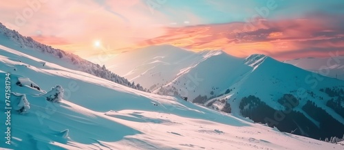 snow mountain slopes in the rays of sunset