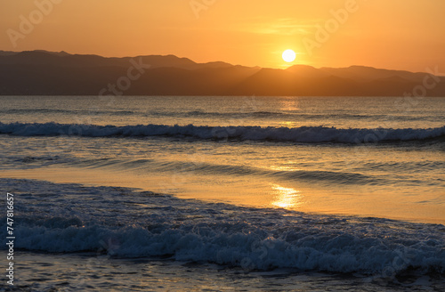 winter sunset on the Mediterranean sea against the backdrop of mountains 1