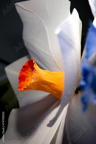 Artificial Crepe Paper Flowers. Narcissus. Shadows. Selective Focus.