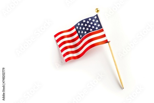 American flag on toothpick for USA campaign votes, isolated on white background.