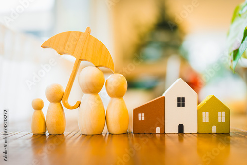 Umbrella icon and family model, Security protection and health insurance. The concept of family home, protection, health care day, car insurance.
