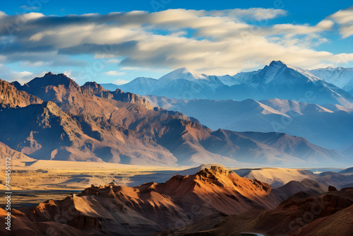 The Unparalleled Beauty of Afghanistan: A Serene Dance of Sunlit Mountain Ranges and Shadows