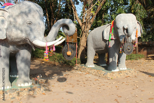 statues of elephants in a temple in lamphun in thailand 