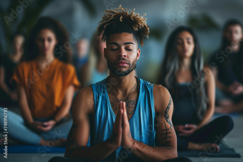  Group meditation at seated cross-legged meditation practice during workout yoga session at sports club, breath exercise, closed eyes