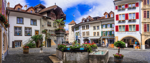 Charming medieval towns and vilages of Switzerland - old town of Murten with floral streets, canton Fribourg