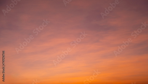 Enjoy panoramic views of the skyline . Sunset in the evening sky with colorful clouds and beautiful cloud patterns Amidst the soft golden light