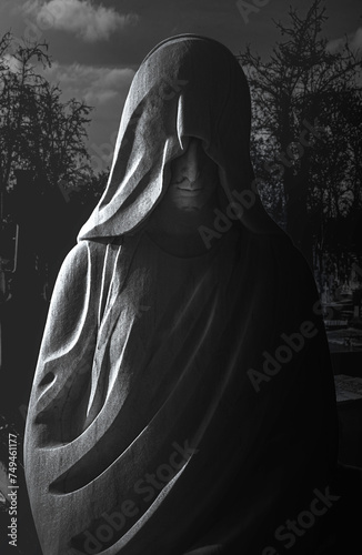 Mysterious sepulchral statue in the Almudena Cemetery, Madrid