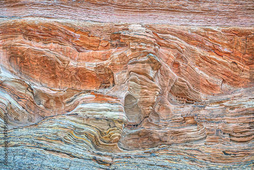 Sandstone is a clastic sedimentary rock composed mainly of sand-sized silicate grains.
