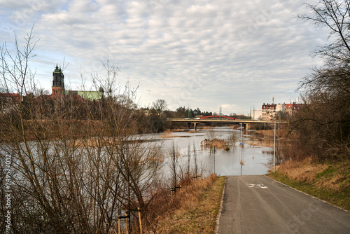 flooded bicycle path on the Warta River in the city of Poznan
