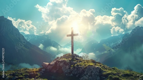 Christian cross against the sky over the mountains
