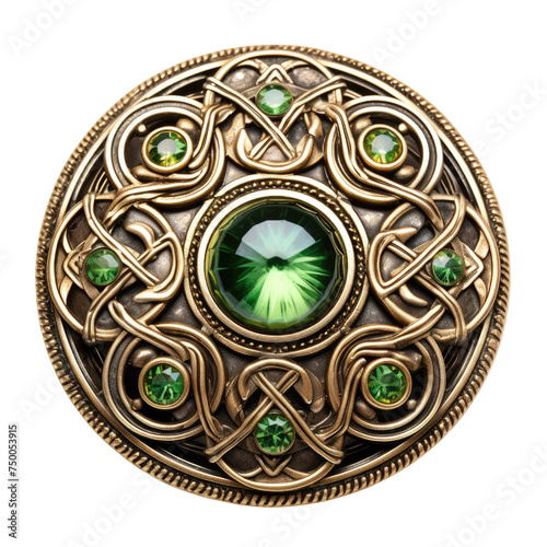 Antique golden brooch with Celtic knot design and embedded emerald gemstones, Concept of vintage jewelry, craftsmanship, and Irish heritage