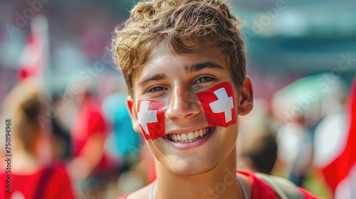 Portrait of football fan with swiss flag on his face. Concept of 2024 UEFA European Football Championship 