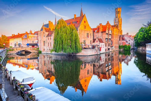 Bruges, Belgium. Rozenhoedkaai Canal in downtown of Brugge, sunrise colors. Famous Flanders destination.