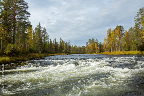 Beautiful autumnal river landscape of Kitkajoki (Kitka river) in Northern Finland