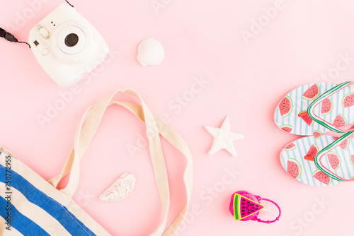 Summer resort things on pink background