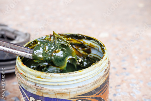 Green type grease in a jar