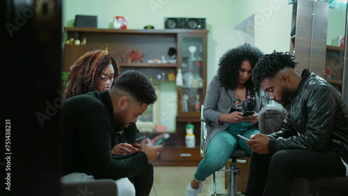 Group of Four People Enveloped in Technological Bubbles - Hypnotized by Phones, Illustrating Isolation and Smartphone Overuse