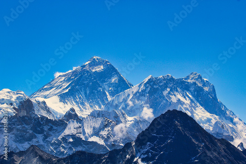 Everest west face and the western wall of Nuptse rise dramatically above the surrounding peaks providing a stunning Himalayan portrait from the top of Gokyo Ri in Nepal