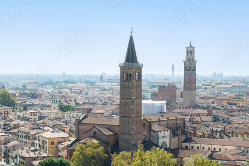 View of Tower of Basilica of Saint Anastasia and Lamberti Tower (Torre dei Lambert) in Verona city center; Veneto, Italy