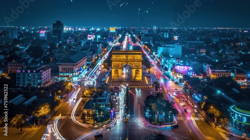 Arc de Triomphe in Vientiane, Lao PDR, night aerial view. There are colorful fireworks.