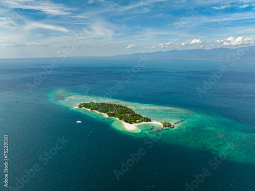 Aerial view of beach resort with enclosed turquoise water. Buenavista Island. Davao. Philippines.