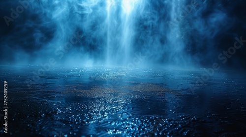 It is a dark street, a wet asphalt road, and reflections in the water. It is an abstract dark blue background, smoke, smog and an empty dark scene with neon light and spotlights scattered about.
