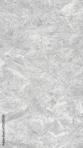 Monochrome black and white (gray) plywood recycled compressed wood chippings board texture, abstract background, material design.board patterns, space for work, banner, wallpaper. Close up. Vertical.