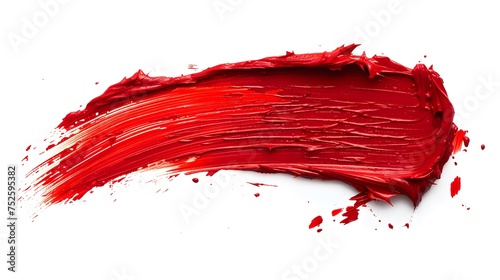 Red lipstick smear isolated on white background. Red color cosmetic product brush stroke swipe sample. Beauty makeup product texture. Top view