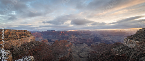 Panorama of dramatic light during sunrise in the Grand Canyon in winter