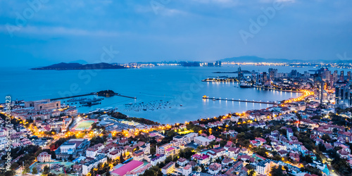 Night Scenery of Qingdao Pier and Urban Skyline in Shandong, China