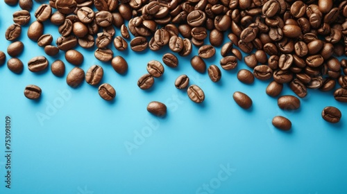 This vibrant image showcases a scattering of aromatic coffee beans on a striking blue backdrop, creating a sense of rejuvenation and tranquility within a contemporary café setting.