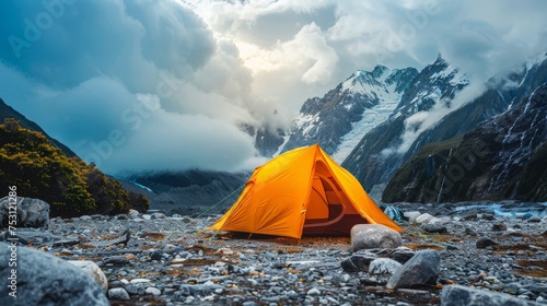 Tent Near Glacier Under Clouds Yellow Background