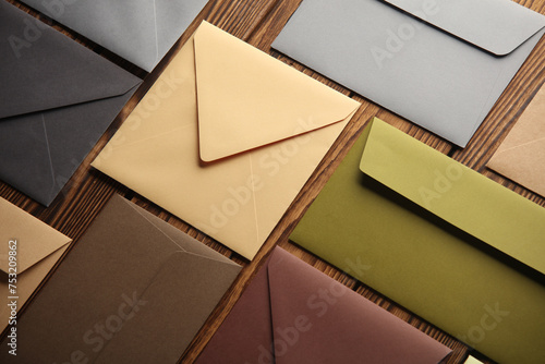 Creative layout of colored envelopes on wooden boards