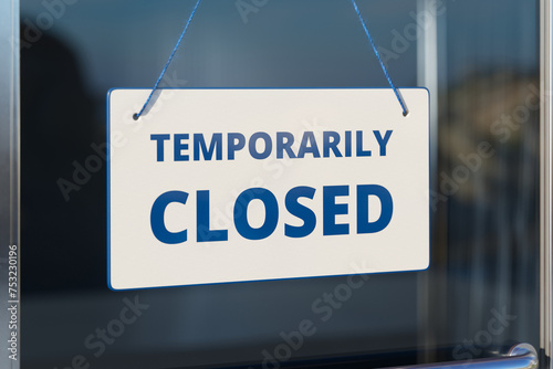 Notice of Temporary Closure on Business Establishment's Glass Door