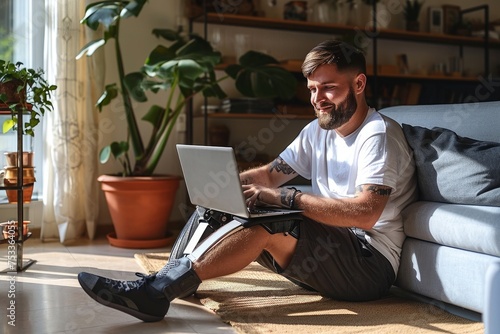 Happy young man with disability leg prosthesis sitting on floor at home using laptop computer working or elearning, browsing web, searching online. People with amputation disabilities, Generative AI