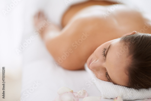 Relax, massage and girl on bed at spa for health, wellness and balance with luxury holistic treatment. Self care, sleep and woman on table for body therapy, comfort and calm pamper service at hotel